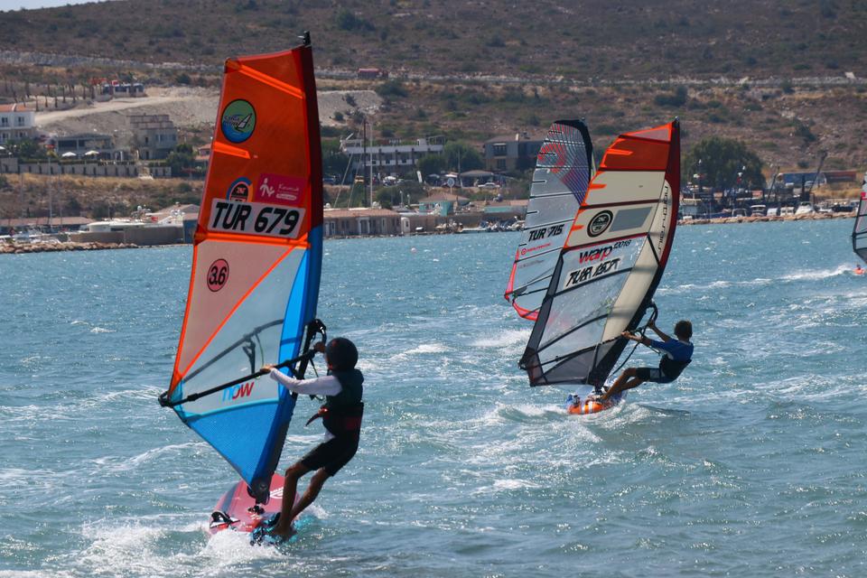 In this file photo from August 31, 2019, surfers enjoy Alacati's famous winds. Alacati hosted the International Funboard Class Association's (IFCA) Junior, Youth and Masters Slalom European Championships in September 2019.